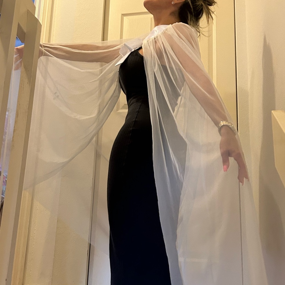 Beautiful white resort wear bathing suit wrap never used.